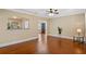Spacious living room featuring hardwood floors, neutral paint, and decorative archways at 1333 W Yale St, Orlando, FL 32804