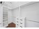 Spacious walk-in closet with built-in shelves and drawers for optimal organization at 1333 W Yale St, Orlando, FL 32804