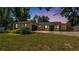 Charming single Gathering home with a large front yard, and long driveway at 1510 Jaguar Cir, Apopka, FL 32712