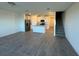 Open concept living space with recessed lighting, modern appliances, and tile flooring at 16464 Happy Eagle Dr, Clermont, FL 34714