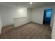 Upstairs loft featuring neutral carpeting, recessed lighting, and a view to another room at 16464 Happy Eagle Dr, Clermont, FL 34714