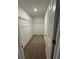 Walk-in closet with carpet flooring and wire shelving for ample storage at 16464 Happy Eagle Dr, Clermont, FL 34714