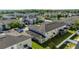 Aerial view of a residential neighborhood with green lawns and tree-lined streets at 2016 Cypress Bay Blvd, Kissimmee, FL 34743