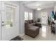 Bright living room with lots of natural light and a comfortable couch at 2016 Cypress Bay Blvd, Kissimmee, FL 34743