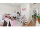 Bright playroom with hardwood floors, an open doorway, and lots of toys at 2016 Cypress Bay Blvd, Kissimmee, FL 34743