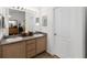 Bathroom featuring double sinks and a large mirror at 20335 Macon Pkwy, Orlando, FL 32833