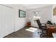 Cozy bedroom featuring wood floors, bright natural light, and closet at 20335 Macon Pkwy, Orlando, FL 32833