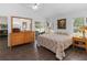 Bedroom featuring wood floors, natural light, and a serene atmosphere at 20335 Macon Pkwy, Orlando, FL 32833