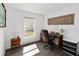 Bright bedroom space with a large window providing natural light and wood floors at 20335 Macon Pkwy, Orlando, FL 32833