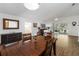 Bright dining area with wood floors, sliding glass doors and a large dining table at 20335 Macon Pkwy, Orlando, FL 32833