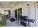 Enjoy outdoor relaxation on this patio with a ceiling fan and comfortable seating at 20335 Macon Pkwy, Orlando, FL 32833