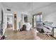 Bedroom includes access to a balcony, closet with doors, ceiling fan and wood-look flooring at 2329 Oak Park Way # 204, Orlando, FL 32822