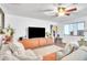 Comfortable living room showcasing modern decor and sleek entertainment center at 2329 Oak Park Way # 204, Orlando, FL 32822