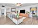 Comfortable living room showcasing modern decor and sleek entertainment center at 2329 Oak Park Way # 204, Orlando, FL 32822