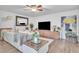 Comfortable living room showcasing modern decor and sleek entertainment center at 2329 Oak Park Way # 204, Orlando, FL 32822