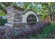 Stone entrance sign for Lake View on Lake Fredrica amid landscaping and mature trees at 2329 Oak Park Way # 204, Orlando, FL 32822