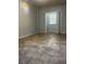 The basement has open space and a window at 235 Crabtree Ave, Orlando, FL 32835