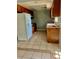 Kitchen with tile floor and wood cabinets at 235 Crabtree Ave, Orlando, FL 32835