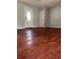The living room has gray walls and hardwood floors at 235 Crabtree Ave, Orlando, FL 32835