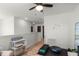 Upstairs bonus room features a ceiling fan, and laminate floors at 2683 Bobcat Chase Blvd, Oakland, FL 34787