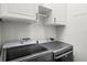 Clean, organized laundry area with modern washer and dryer units at 2683 Bobcat Chase Blvd, Oakland, FL 34787
