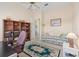Bedroom with neutral walls and ceiling fan at 2780 Highland View Cir, Clermont, FL 34711