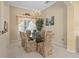 Formal dining room featuring a chandelier and elegant decor at 2780 Highland View Cir, Clermont, FL 34711