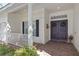 Charming front entrance with double doors and a brick walkway at 2780 Highland View Cir, Clermont, FL 34711