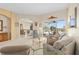 Inviting living room with views of the pool and golf course at 2780 Highland View Cir, Clermont, FL 34711