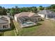 A screened in pool and back yard, perfect for relaxing and entertaining at 2780 Highland View Cir, Clermont, FL 34711