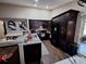 Modern kitchen with granite countertops and dark wood cabinets at 2979 Cool Breeze Cir, St Cloud, FL 34769