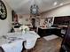 Open-concept dining and living area with stylish furnishings and modern lighting at 2979 Cool Breeze Cir, St Cloud, FL 34769