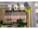 Aerial view of the property including the backyard, patio, fence and roofs at 3103 Yorych Ln, Orlando, FL 32822