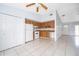 Open kitchen featuring tile floors, ample cabinet space, and classic appliances at 3103 Yorych Ln, Orlando, FL 32822