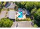 Aerial view of the community pool and tennis court at 3103 Yorych Ln, Orlando, FL 32822