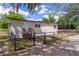 Charming single-story home featuring well-maintained yard, fenced perimeter, and inviting front entrance with wood stairs at 33506 Luana Ct, Leesburg, FL 34788
