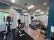 Well-equipped gym featuring cardio machines and free weights, promoting an active and healthy lifestyle at 3420 Gerber Daisy Ln, Oviedo, FL 32766