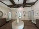 Welcoming lobby features elegant decor, wood floors, seating, and decorative lighting at 3420 Gerber Daisy Ln, Oviedo, FL 32766