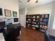 Home office space with shelves filled with sports memorabilia and collectables at 3420 Gerber Daisy Ln, Oviedo, FL 32766