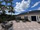 Charming outdoor patio area with comfortable seating, creating a relaxing space within the community at 3420 Gerber Daisy Ln, Oviedo, FL 32766