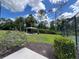 Outdoor picnic area featuring covered seating, green space, and landscaping for community enjoyment at 3420 Gerber Daisy Ln, Oviedo, FL 32766