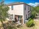 Charming outdoor patio with lovely landscaping, perfect for relaxation and entertaining at 3449 Seneca Club Loop # B, Orlando, FL 32808