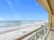 Beautiful ocean views from the balcony of this condo featuring tiled floor and metal railing at 4071 S Atlantic Ave # 803, New Smyrna Beach, FL 32169