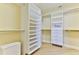 Walk-in closet offering custom shelving, drawers, and ample storage space at 4071 S Atlantic Ave # 803, New Smyrna Beach, FL 32169
