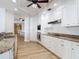 Gourmet kitchen with stainless steel appliances, custom cabinetry, and granite countertops, perfect for cooking and entertaining at 4071 S Atlantic Ave # 803, New Smyrna Beach, FL 32169
