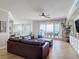 Relaxing living room with comfy couch and great ocean views at 4071 S Atlantic Ave # 803, New Smyrna Beach, FL 32169