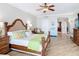 Inviting main bedroom boasts a decorative headboard and light wood flooring at 4071 S Atlantic Ave # 803, New Smyrna Beach, FL 32169
