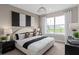 Comfortable main bedroom featuring an over-sized bed, black-out shades, and a large window at 4152 Winding Pines Dr, Apopka, FL 32712