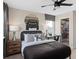 This is a comfortably appointed bedroom with desk area and walk-in closet at 4152 Winding Pines Dr, Apopka, FL 32712
