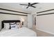 This bedroom features a ceiling fan, neutral walls, and comfortable furnishings at 4152 Winding Pines Dr, Apopka, FL 32712